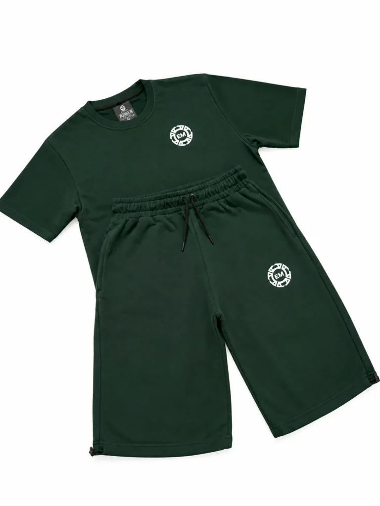 The Salah Set in forest green: terry tee and 3/4 shorts laid flat