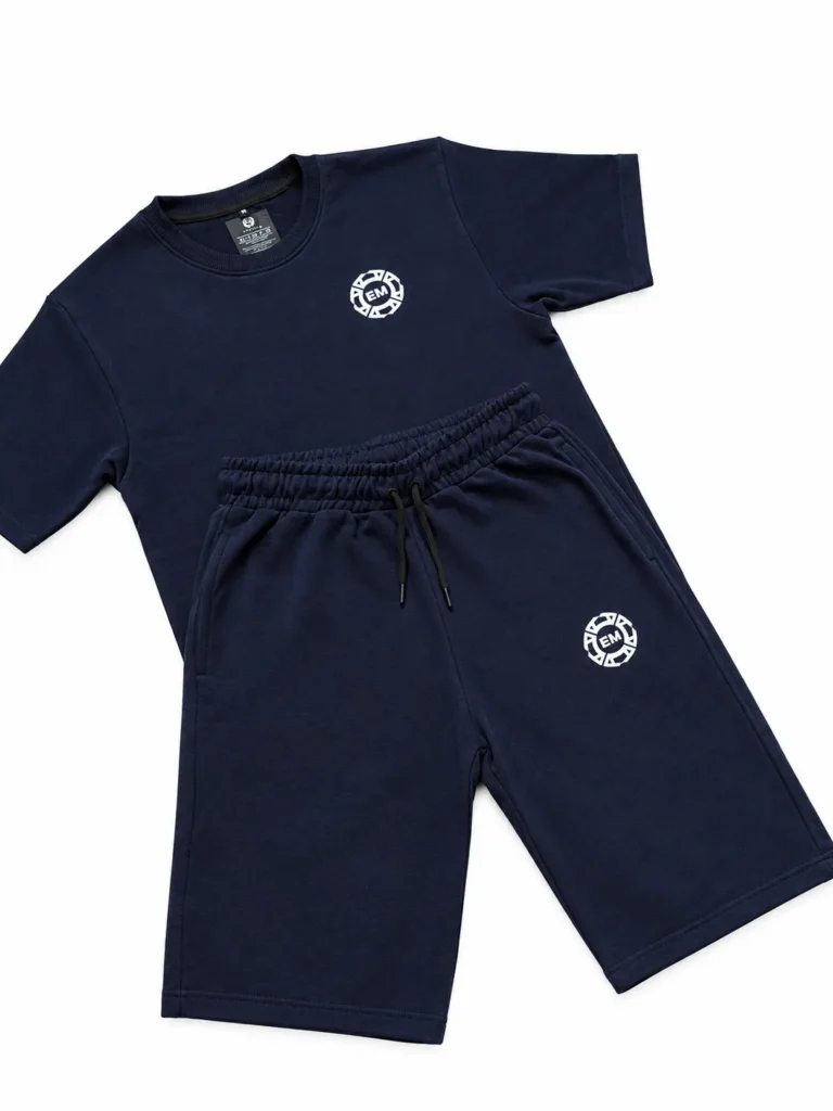 The Salah Set in navy blue: terry tee and 3/4 shorts laid flat