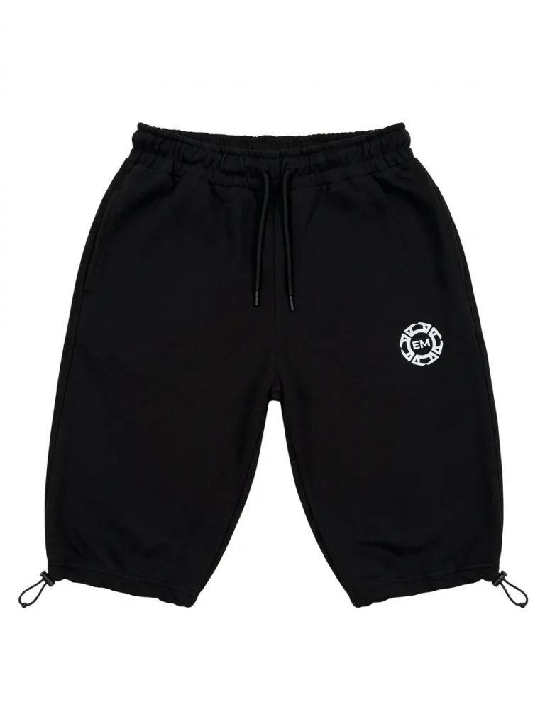 The black Salah Set 3/4 shorts with the hem toggles pulled in